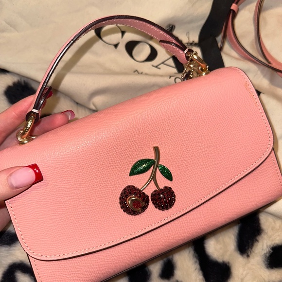 Coach Handbags - Coach Pink Cherry Embellished Clutch